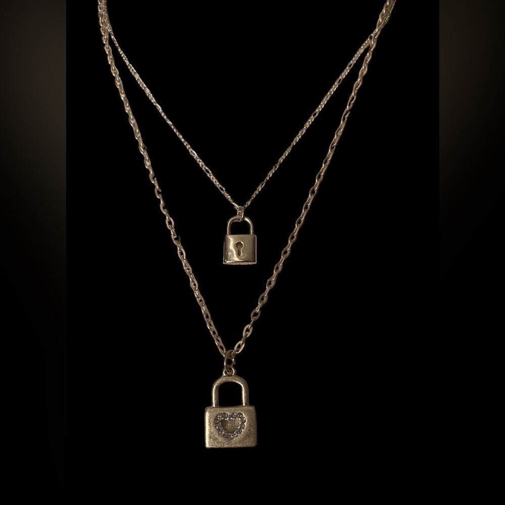 TWO GOLD TONE LOCK PENDANT NECKLACES-CANVAS AND ONE BOUTIQUE BRAND